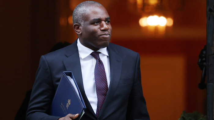 Government overcomes backbench rebellion to pass jury plan