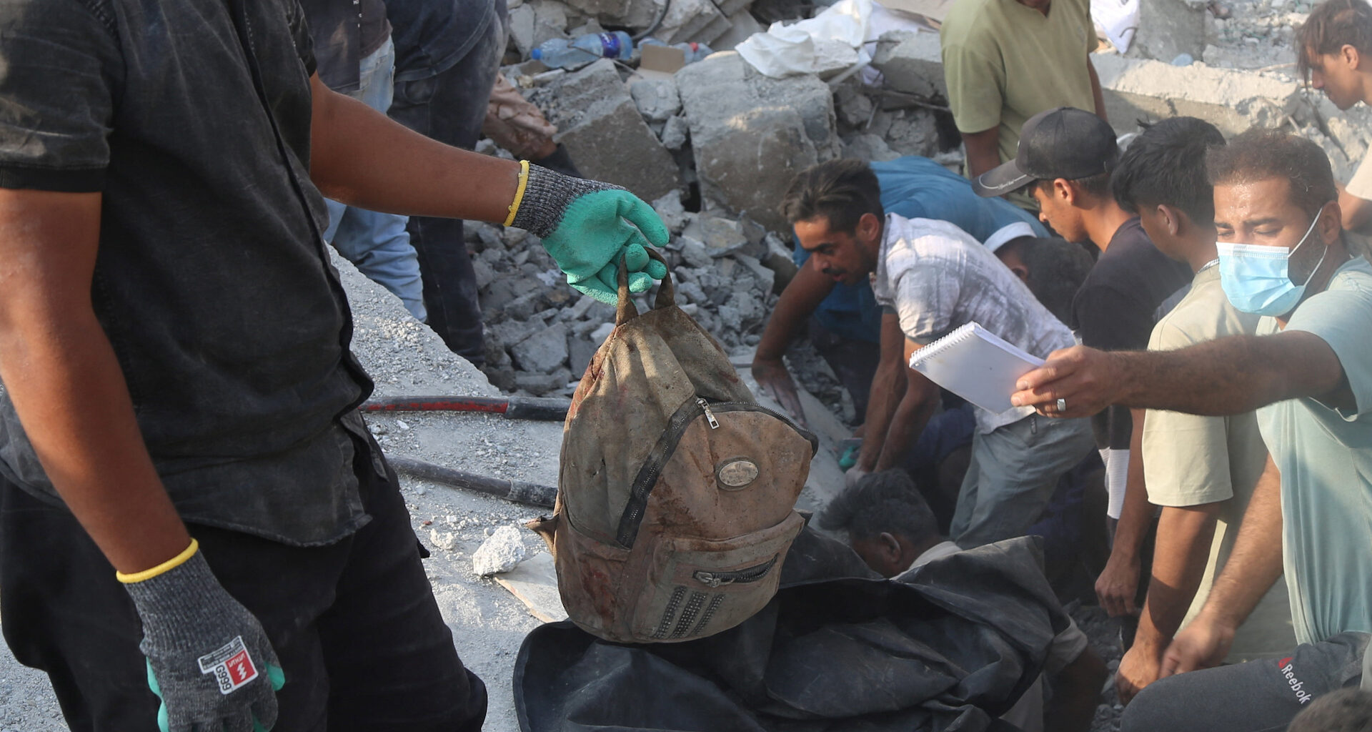 Man accuses Israel of war crimes as he holds remains of girl killed in Iran | Israel-Iran conflict