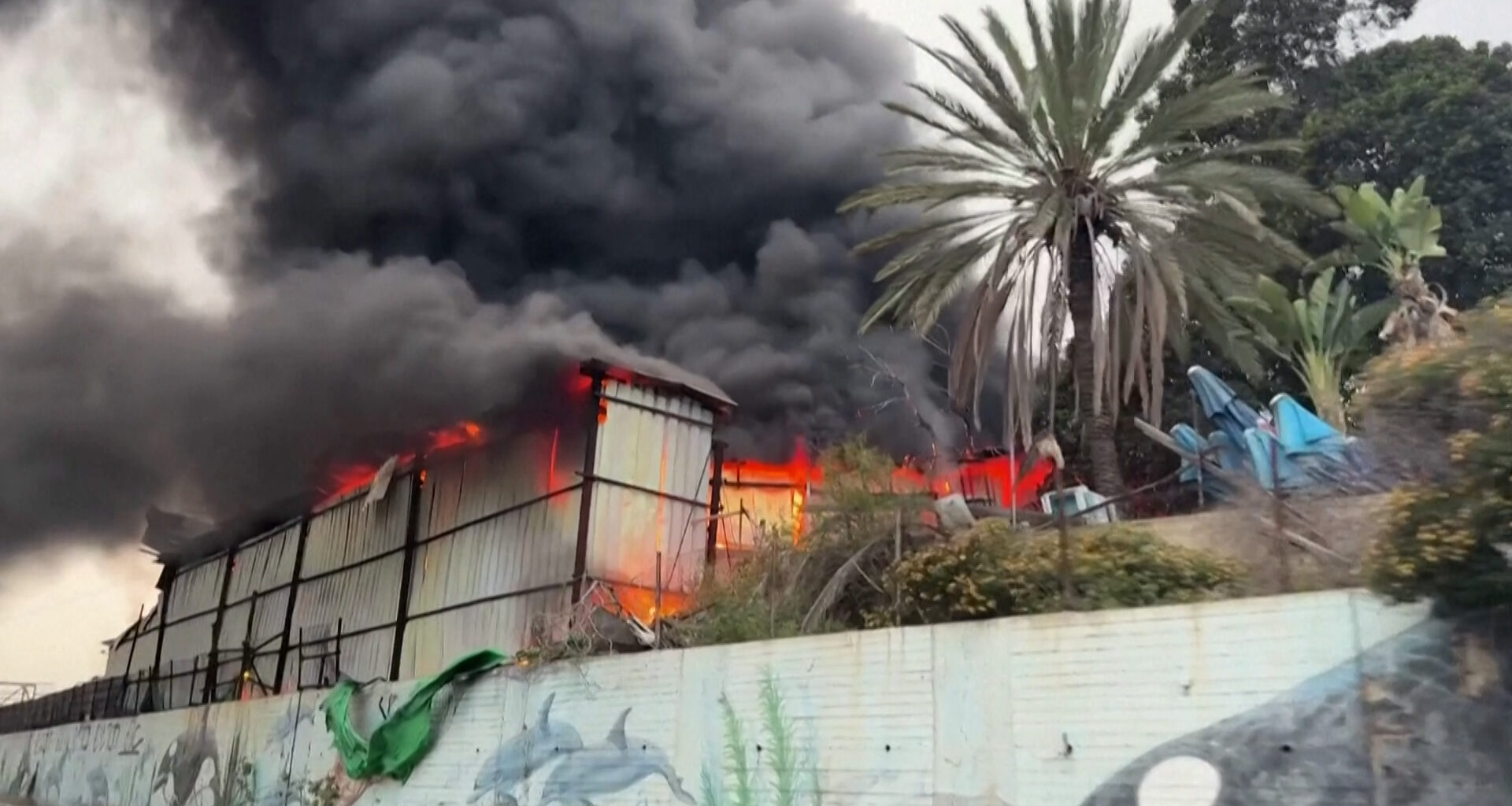 Iranian missile strike in central Israel sets building ablaze | Conflict