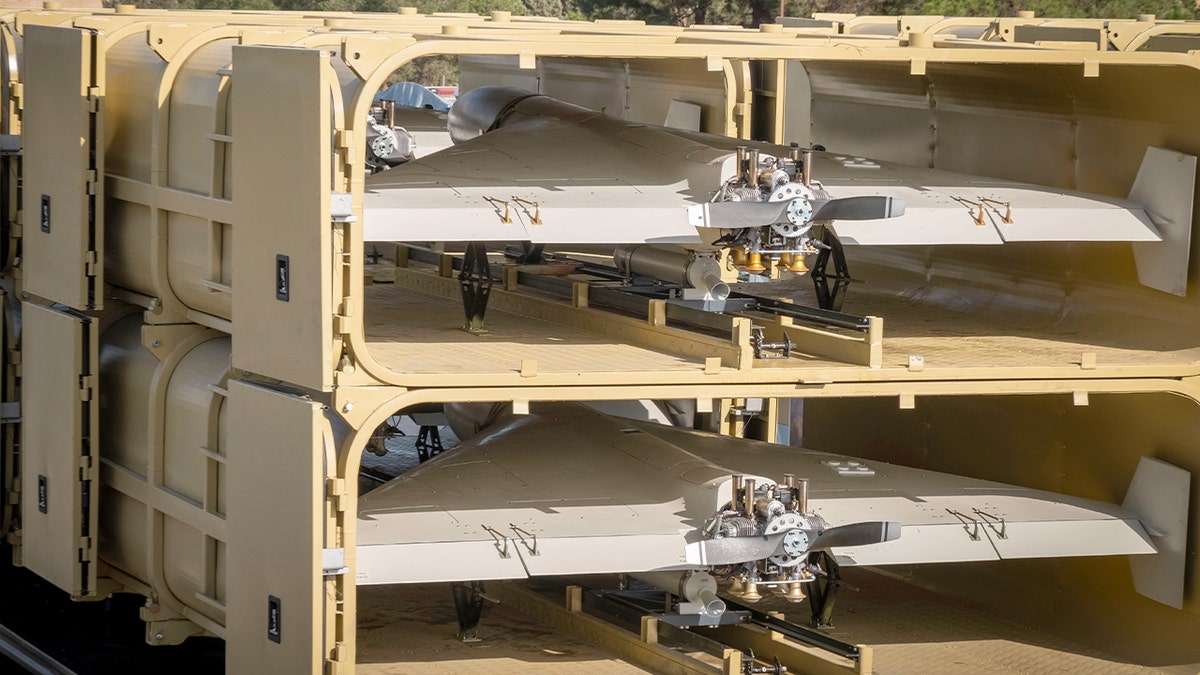 A military truck transports several Shahed-136 drones during a parade near the Khomeini Shrine in Tehran.