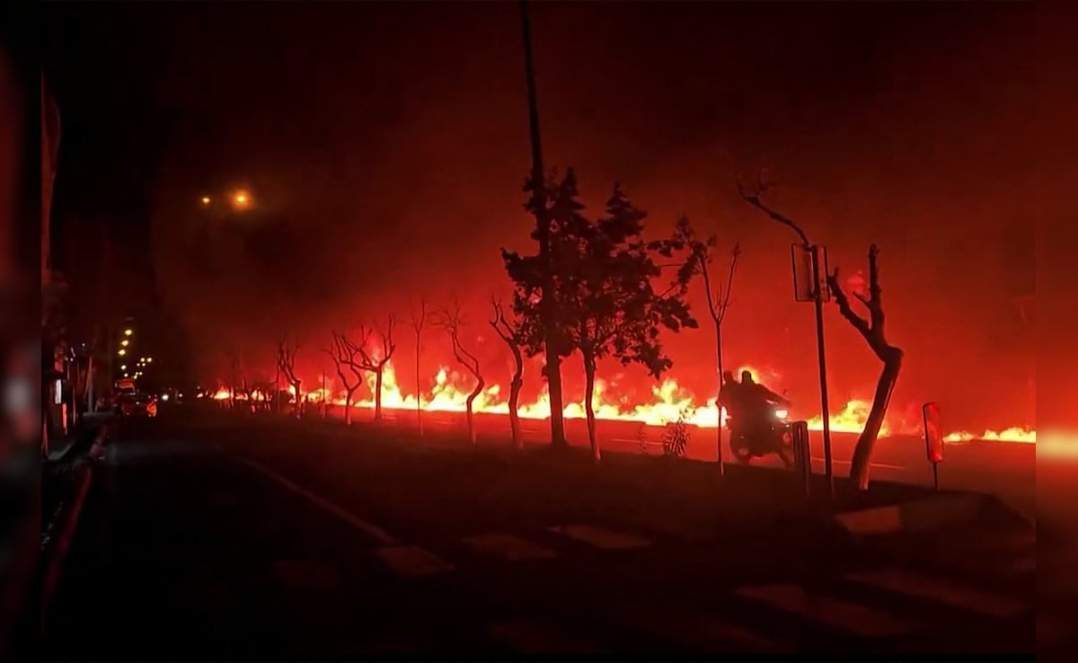 One of the videos posted on social media shows fire erupting at an oil depot in Tehran. (AFP)
