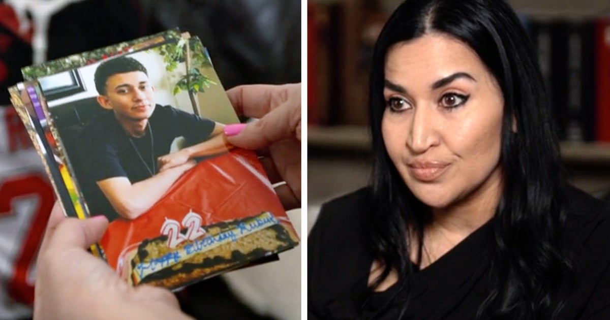 Rachel Reyes with photos of her son, Ruben Ray Martinez