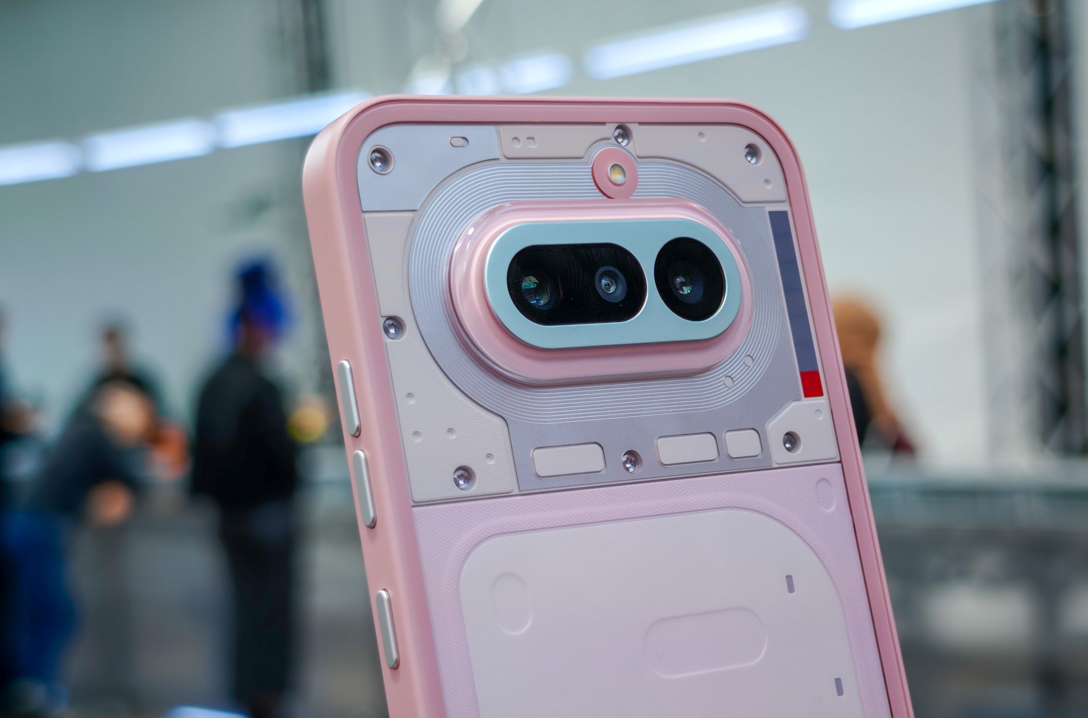 Photo of Nothing Phone 4A in pink at London launch event