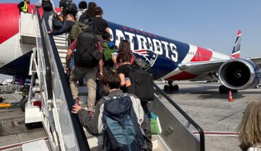 Amid war with Iran, Patriots plane brings Americans in Middle East back home