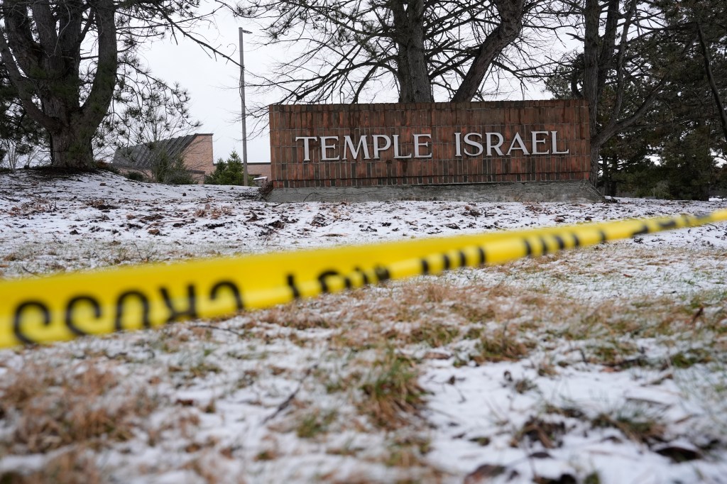 Police tape in front of Temple Israel in West Bloomfield Township, Michigan.