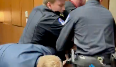 GOP senator joins police in ejecting anti-war protester from Capitol Hill hearing