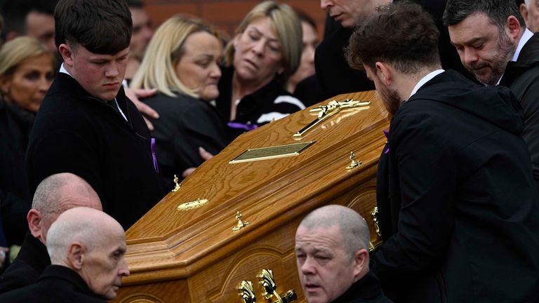 Ms Doherty's coffin is carried from her funeral at Holy Family Church Ballymagroarty, Londonderry. Pic: PA