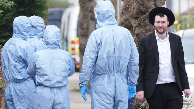 Police officers at the scene. Pic: PA