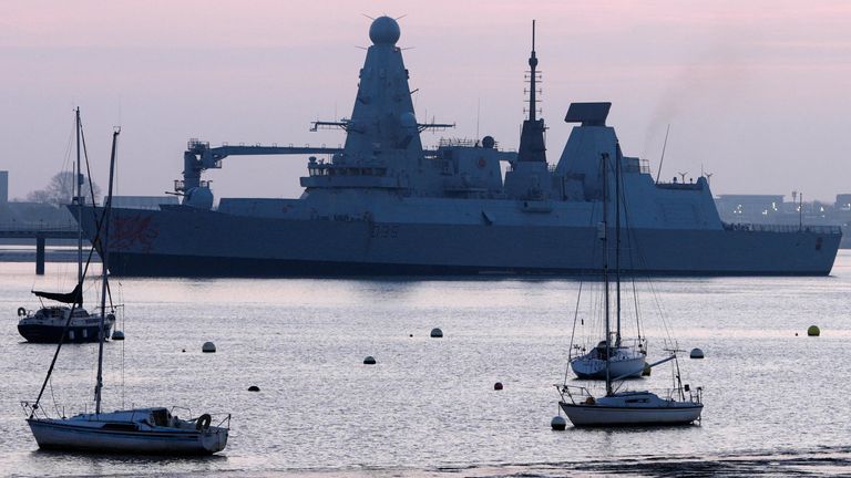 HMS Dragon during ammunitioning operations at Upper Harbour Ammunitioning Facility (UHAF) in Portsmouth Harbour. Pic: Reuters