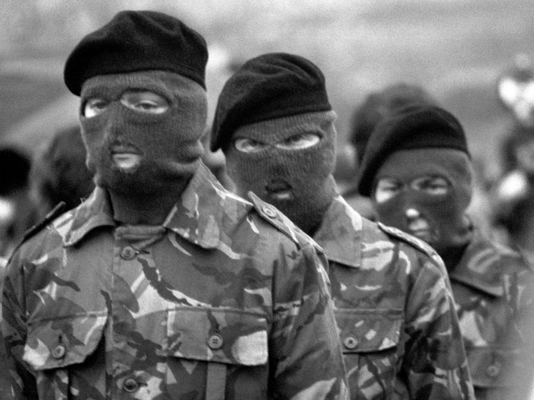 Masked IRA Provisionals at the funeral of hunger striker Bobby Sands. Pic: PA