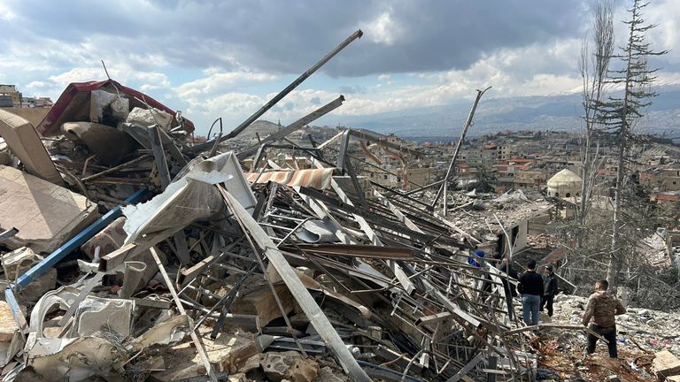 People check the damage left by Israeli airstrikes in Nabi Chit, eastern Lebanon. Pic: AP