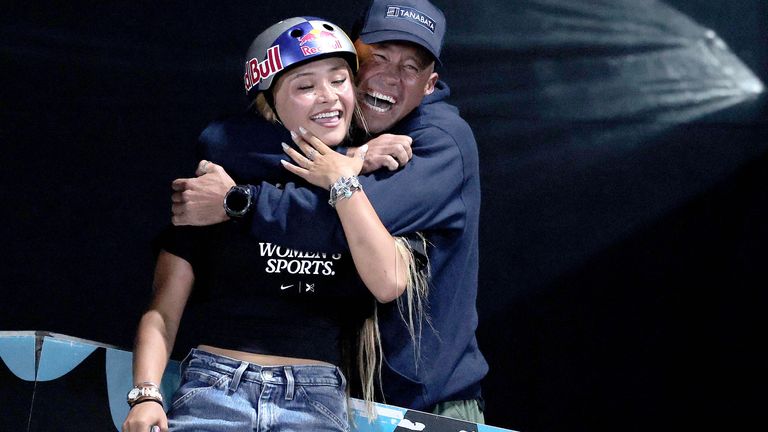 Sky Brown celebrates with her father Stewart Brown. Pic: AP