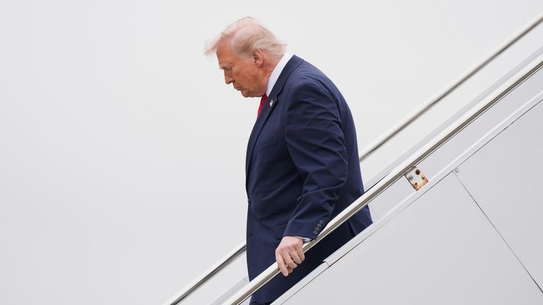 President Donald Trump steps off Air Force One at Dover Air Force Base, Delaware, on 7 March. Pic: AP