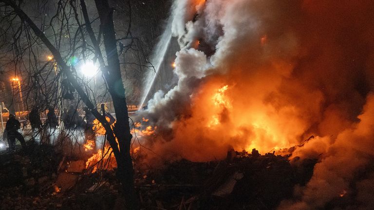 Firefighters battle the blaze. Pic: AP