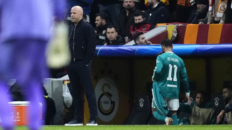 Liverpool's Mohamed Salah leaves the pitch after beng substituted