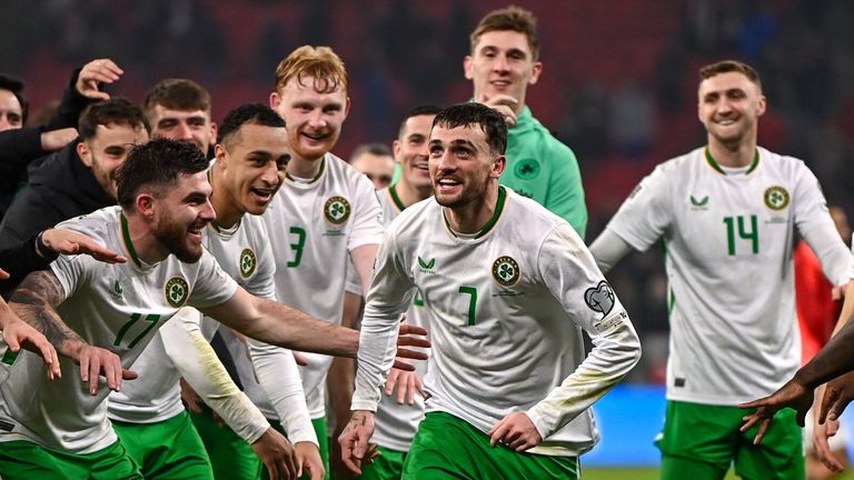 Troy Parrott celebrates with Republic of Ireland team-mates after winning against Hungary