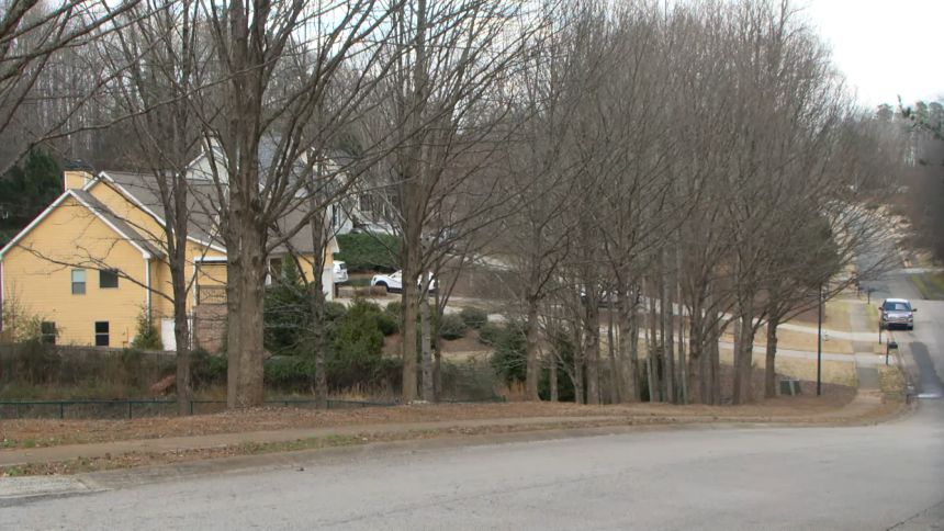 Hughes died outside his home on this street in Hall County.