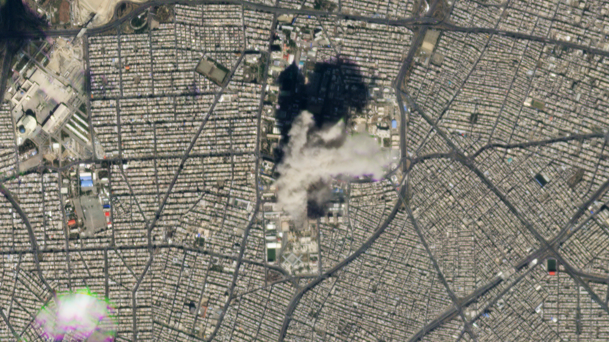 A satellite image showing a plume of smoke above Tehran, Iran on March 1, 2026.