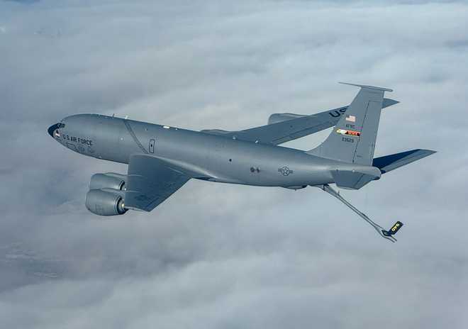 A KC-135 Stratotanker from Beale Air Force Base provides fuel to F-16 Fighting Falcons from Edwards AFB during an early morning test mission Nov. 21, 2024. 412th Test Wing operations at Edwards depend on highly skilled tanker crews from around the country throughout the year. (Air Force photo by Todd Schannuth)