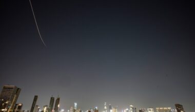 Iran targets Israel and Gulf Arab states even as Trump says US is in talks to end the war