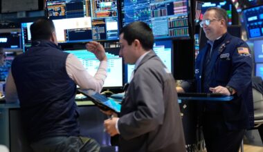 Stocks sink on fears the war with Iran will keep interest rates high