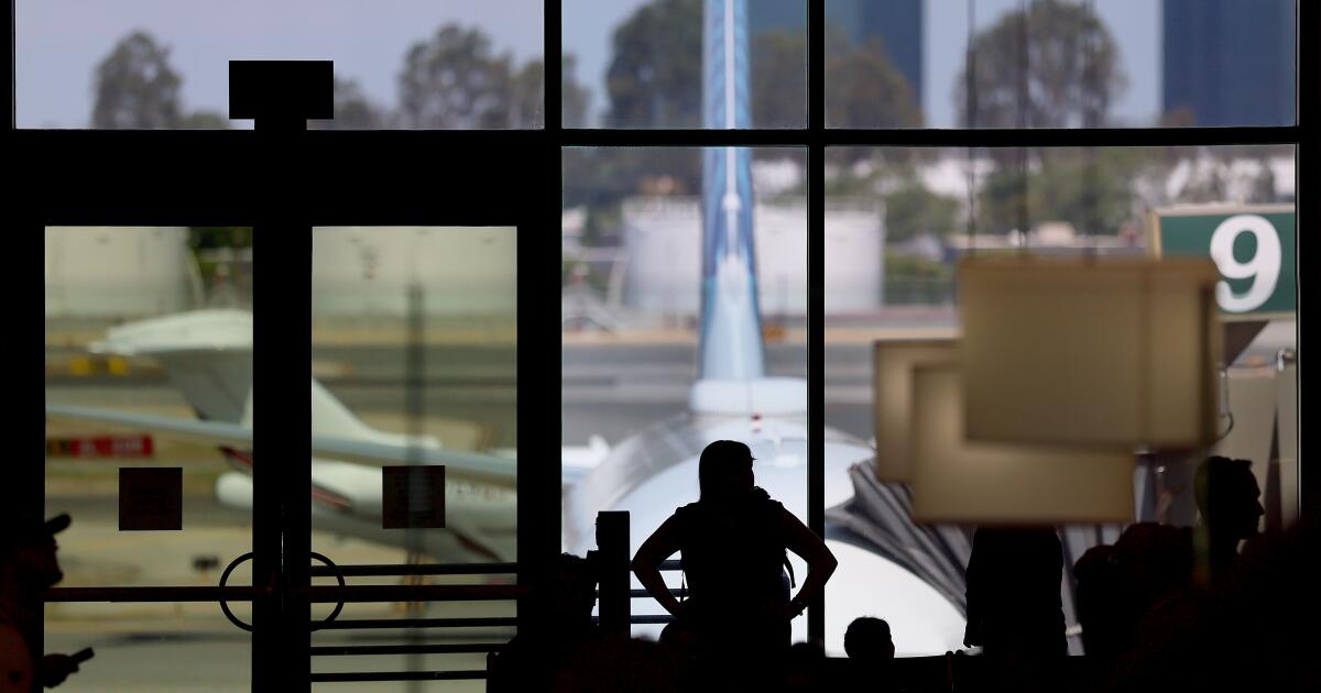 Near miss at O.C. airport as helicopter crosses United jet's path. 'Not good,' controller says