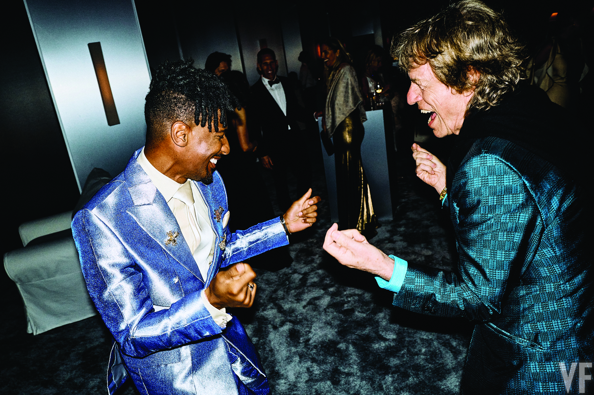 Jon Batiste and Mick Jagger attend the Vanity Fair Oscars after party.
