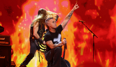 Robbie Williams performs on stage in tribute to Ozzy Osbourne during The BRIT Awards 2026 at Co-op Live on February 28, 2026 in Manchester, England.