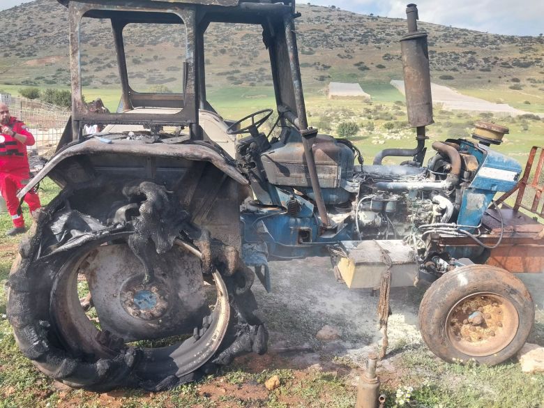 A burned out tractor is seen after Israeli settlers attacked the village of Tayasir in the occupied West Bank