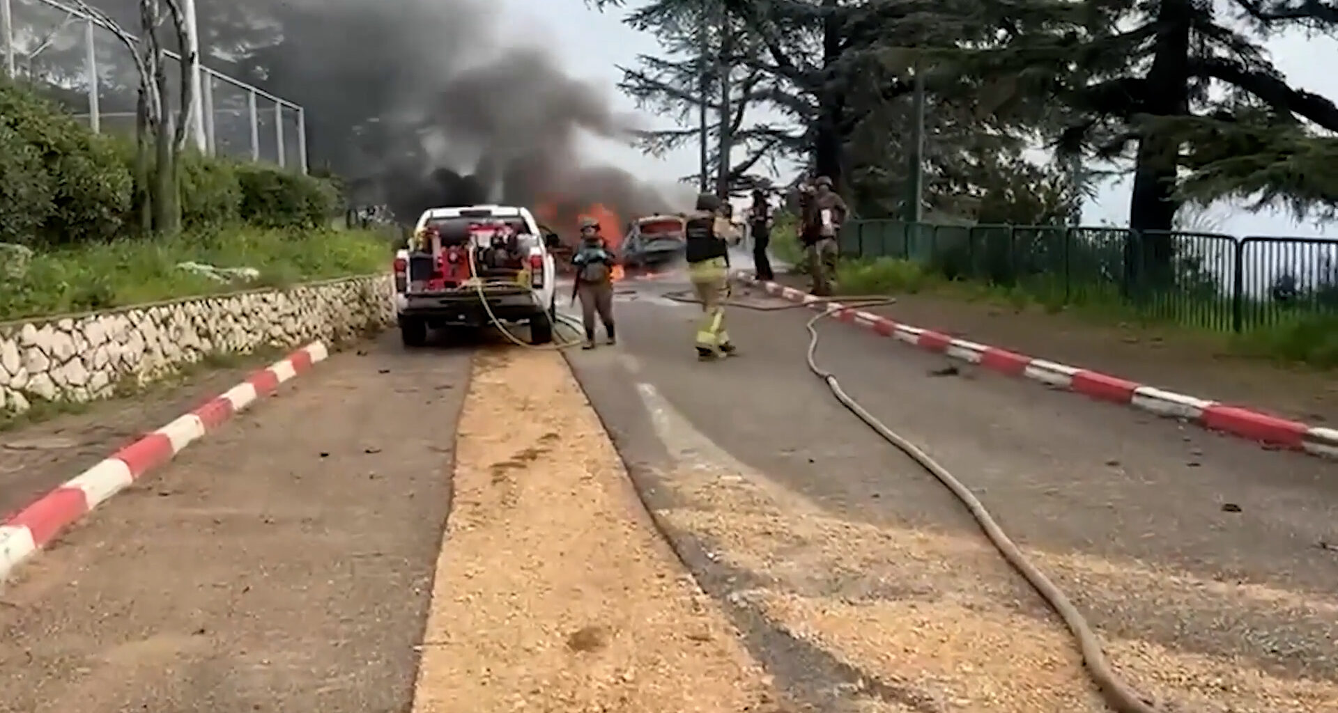 Israeli firefighters battle vehicles blaze after missile attack from Lebano | Israel attacks Lebanon