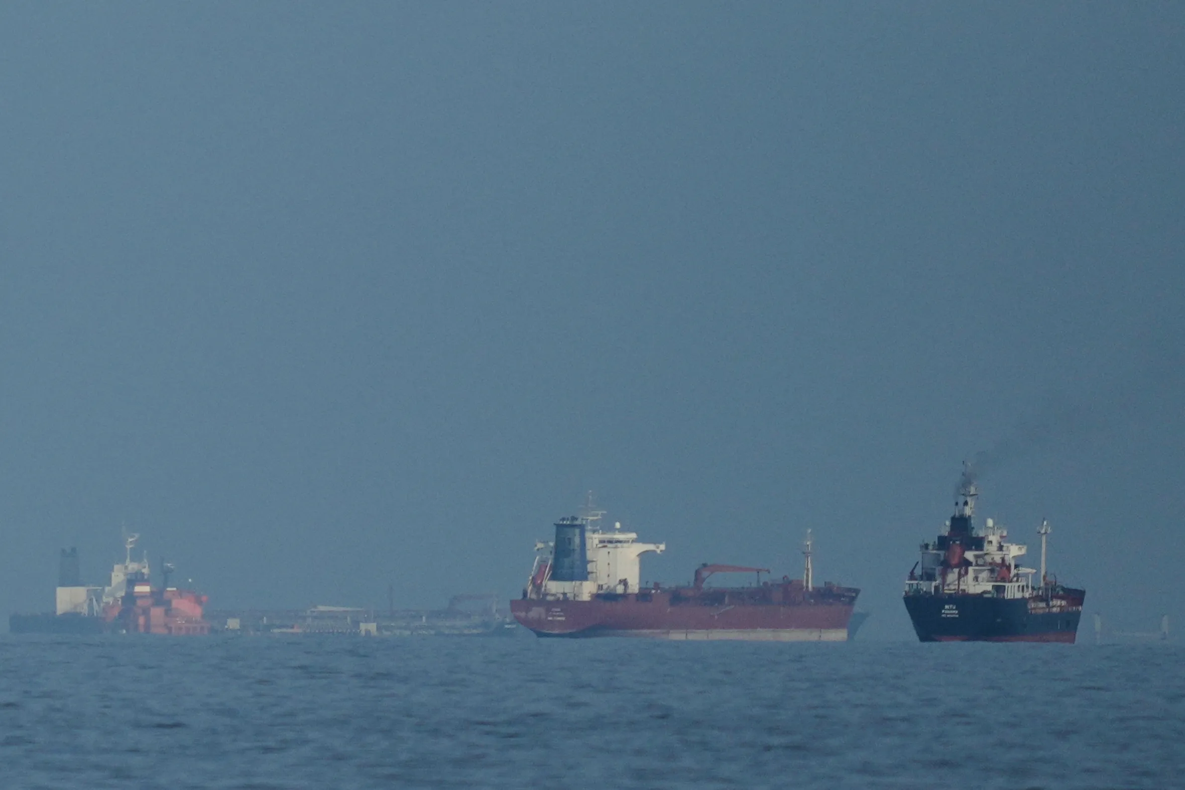 Oil tankers and cargo ships in the Strait of Hormuz.