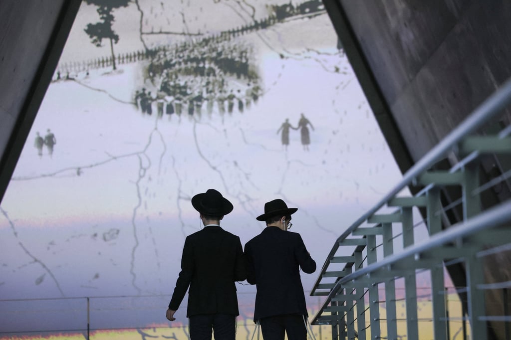 Visitors look at an exhibition ahead of Israel’s national Holocaust memorial day at Yad Vashem, the World Holocaust Remembrance Centre, in Jerusalem, on Sunday. Photo: Reuters