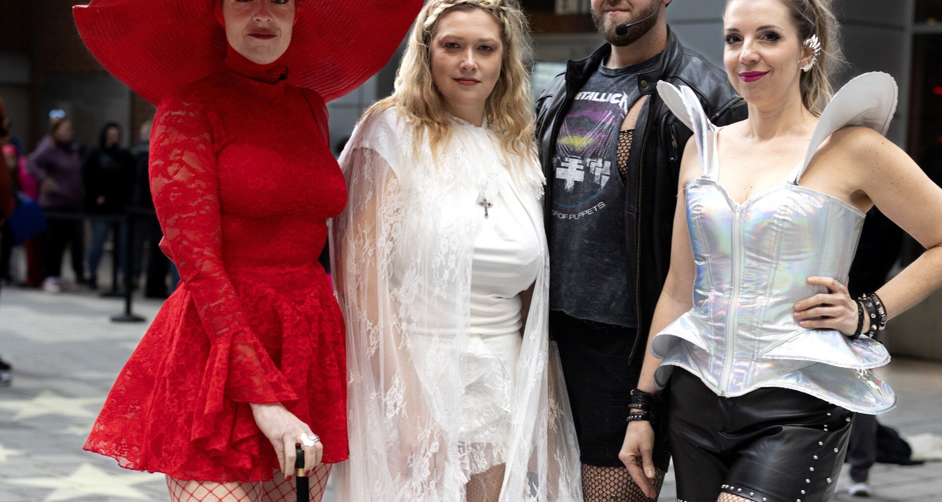 Four people in costume for Lady Gaga concert