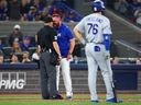 Toronto Blue Jays manager John Schneider lets umpire Dan Merzel have it in the fifth inning during Toronto's 4-1 loss to the Los Angeles Dodgers. Schneider was ejected from the game. 