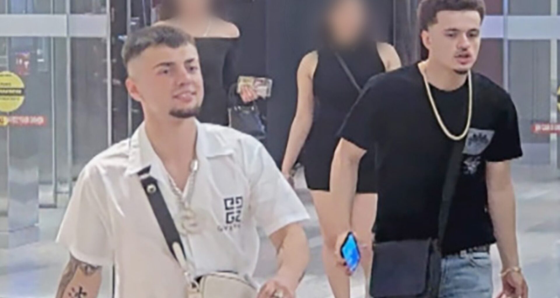 An image recorded by a camera at the Montreal Casino of Chad Pinel (left, wearing a white shirt) and Jayden Pinel (right, wearing a black shirt). The image was recorded hours before Conor Patrick O'Loughlin was killed. The Pinel bothers are charged with second degree murder.