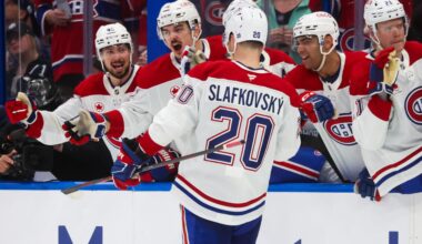 Montreal Canadiens left wing Juraj Slafkovsky celebrates a goal with teammates.