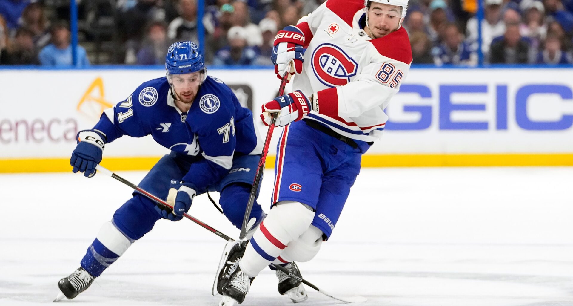Lightning centre Anthony Cirelli trips Canadiens winger Alexandre Texier during the first period of Game 2 on Tuesday in Tampa, Fla.