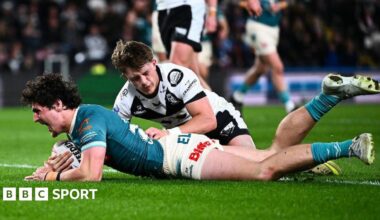Jake Davies roars with delight after diving over the line to ground the ball for his first Super League try