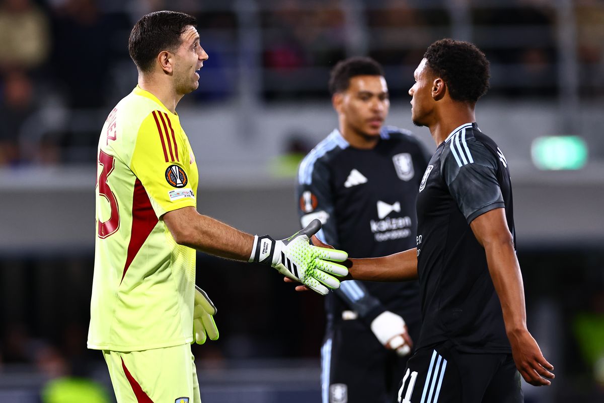 Emi Martinez and Ollie Watkins
