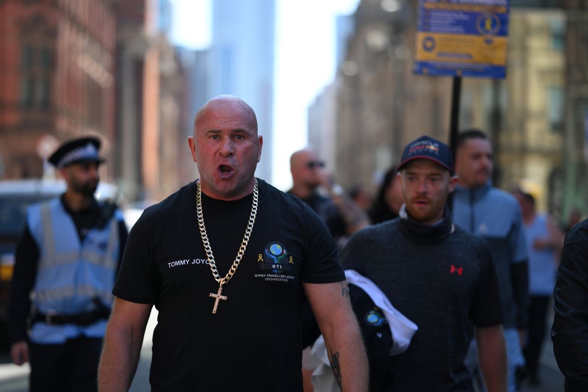 Tommy Joyce leads the protest as it makes it way to Deansgate from St. Peter's Square