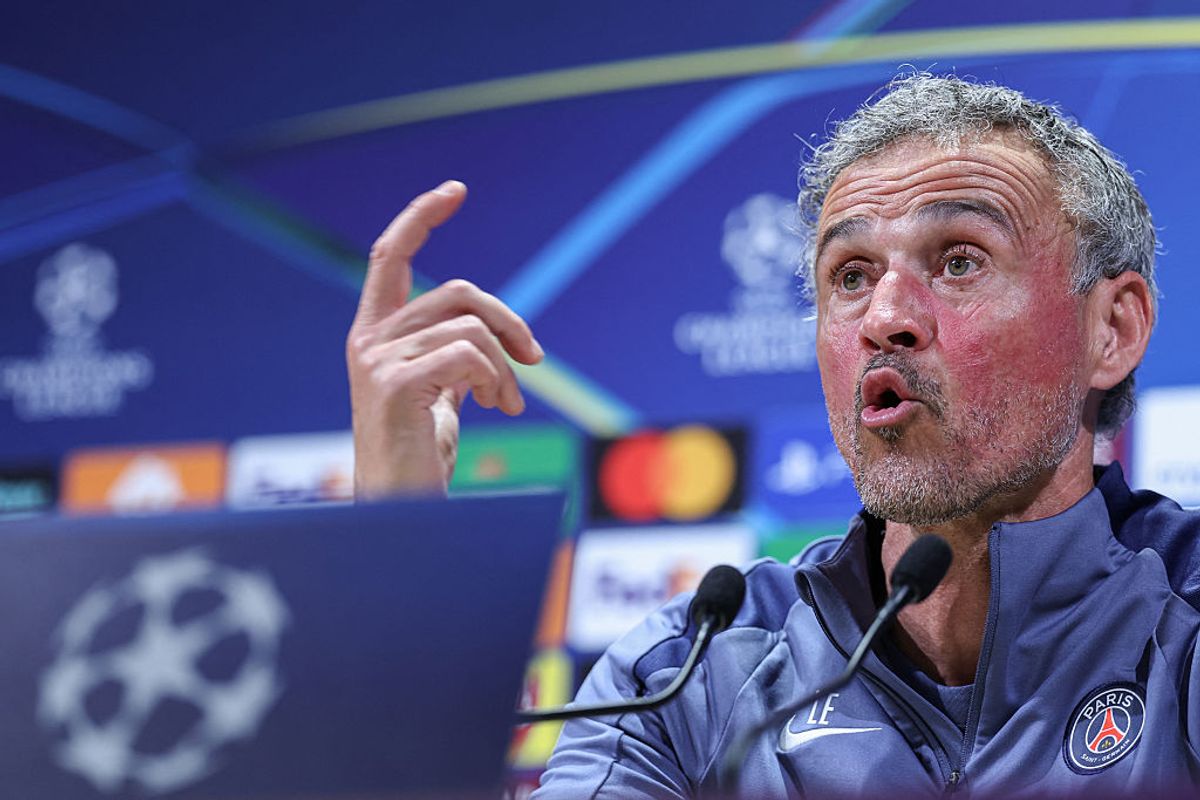 Paris Saint-Germain's Spanish coach Luis Enrique addresses media representatives (Photo by FRANCK FIFE / AFP via Getty Images)