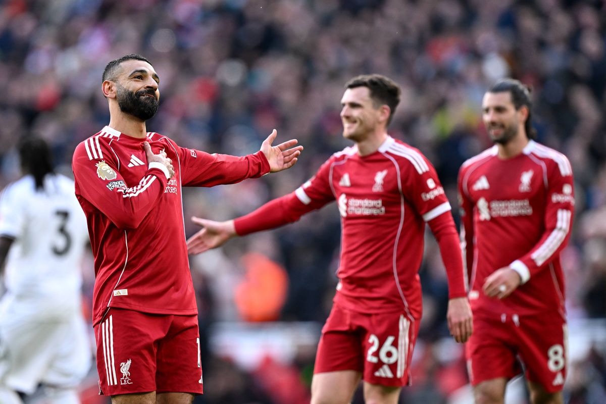 Mohamed Salah of Liverpool celebrates scoring his team's second goal during the Premier League match between Liverpool and Fulham at Anfield