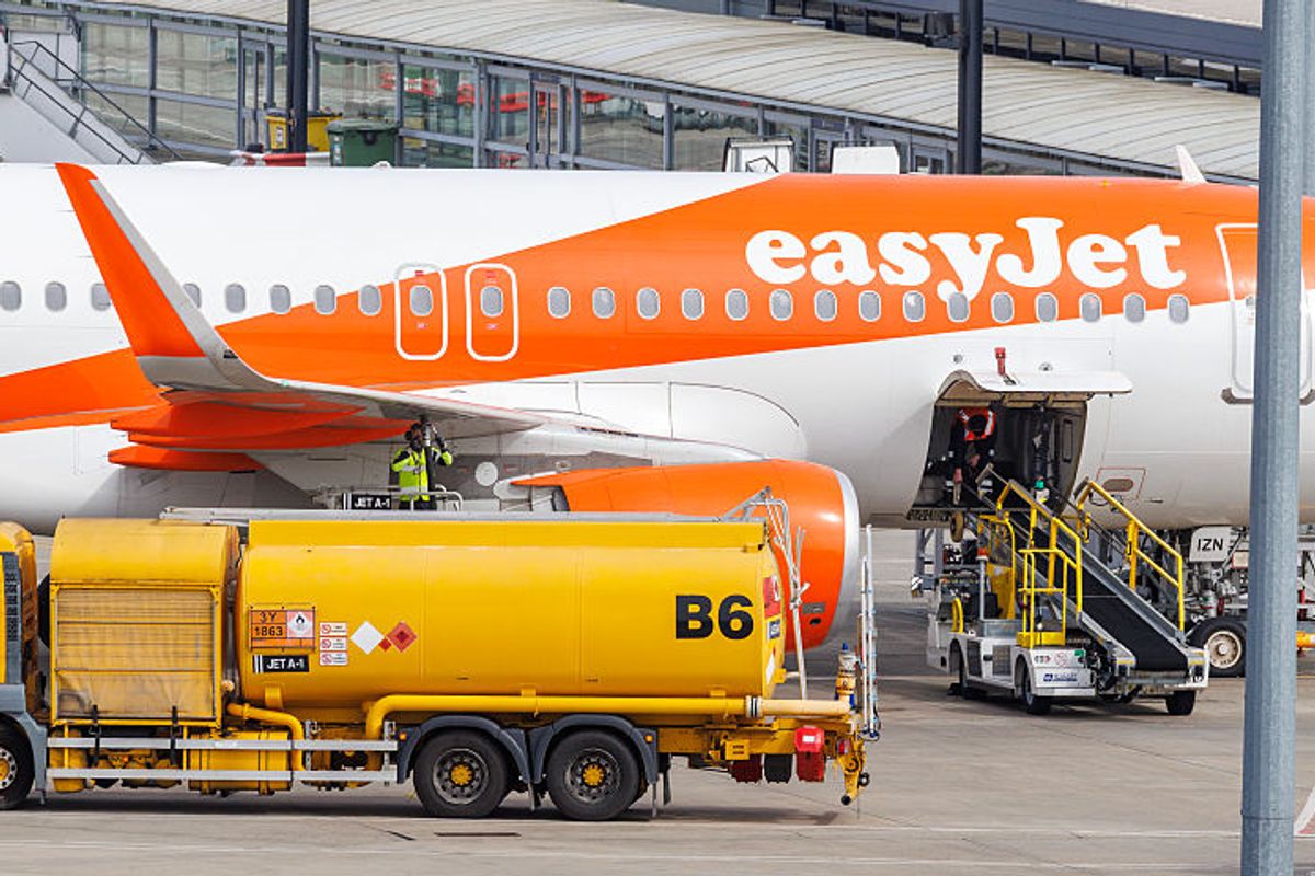 An EasyJet plane is refuelled ahead of takeoff