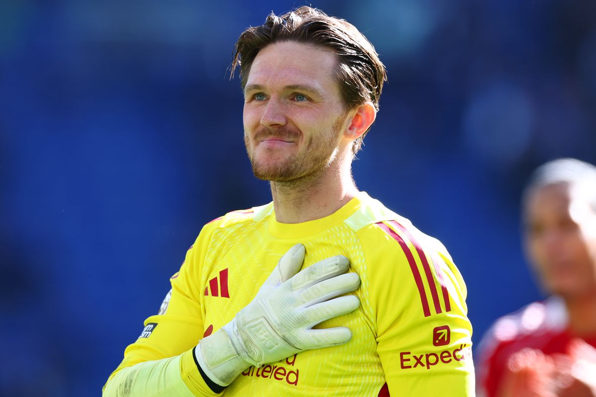 Freddie Woodman of Liverpool salutes the supporters at full-time following the Premier League win against Everton at Hill Dickinson Stadium on April 19 2026