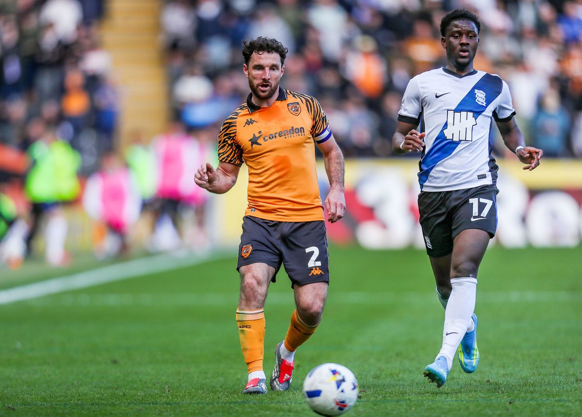 Hull City's Lewis Coyle (left) battles for the ball with  Birmingham City's Ibrahim Osman