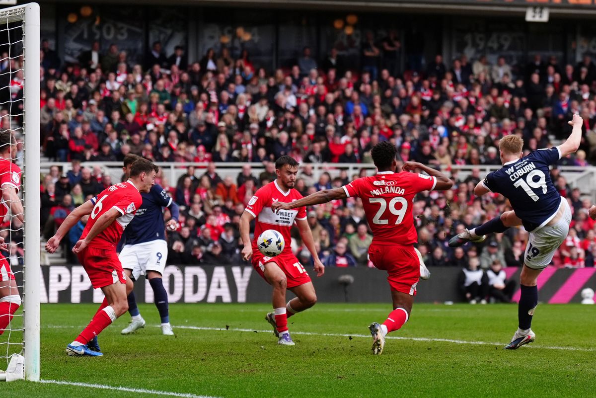 Josh Coburn of Millwall scores against Middlesbrough