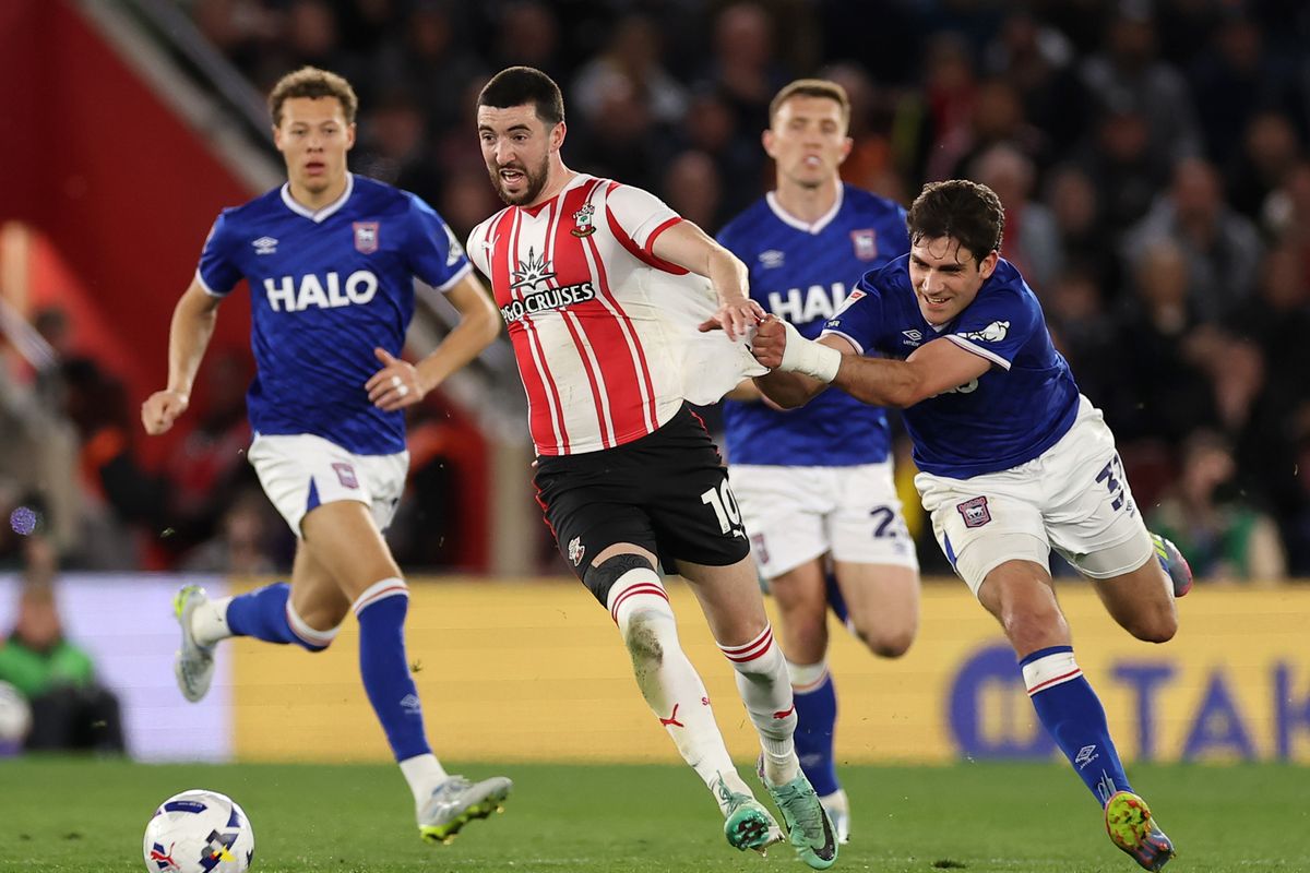 Finn Azaz of Southampton is fouled by Ivan Azon of Ipswich Town