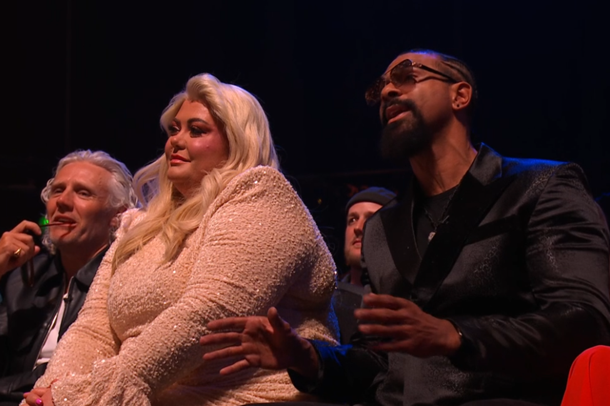 David Haye confronts Adam Thomas from his seat in the audience