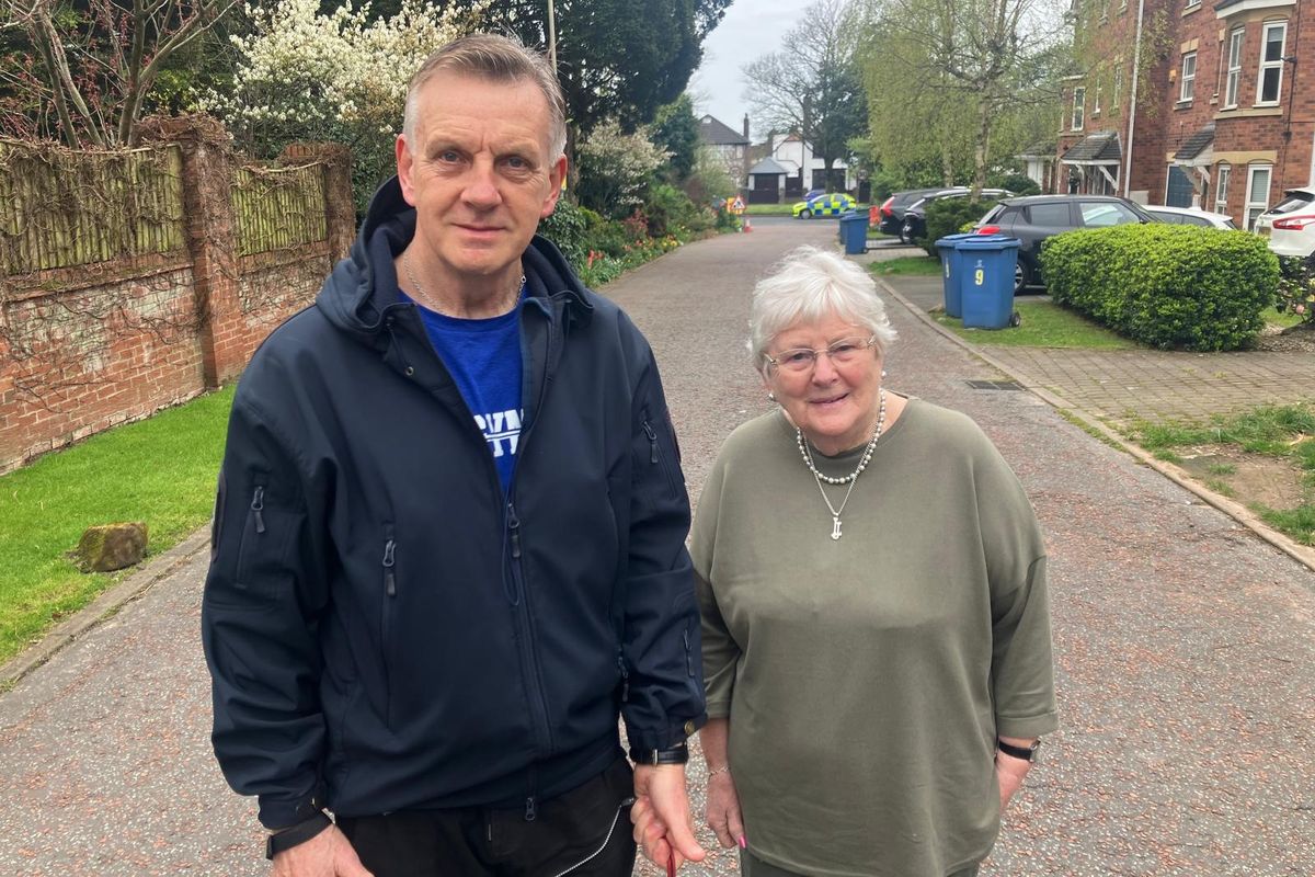 Peter Metcalfe and Joan Groves on Rookery Drive, with queuing traffic on Aigburth Road in the background