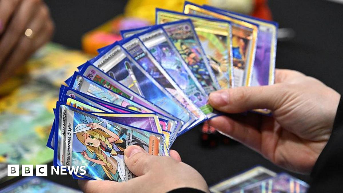 A competitor holds a deck showing a Determinazione Lylia card as they play the Pokémon Trading Card Game during the Pokemon Europe International Championships at ExCel London on February 13, 2026 in London, England.